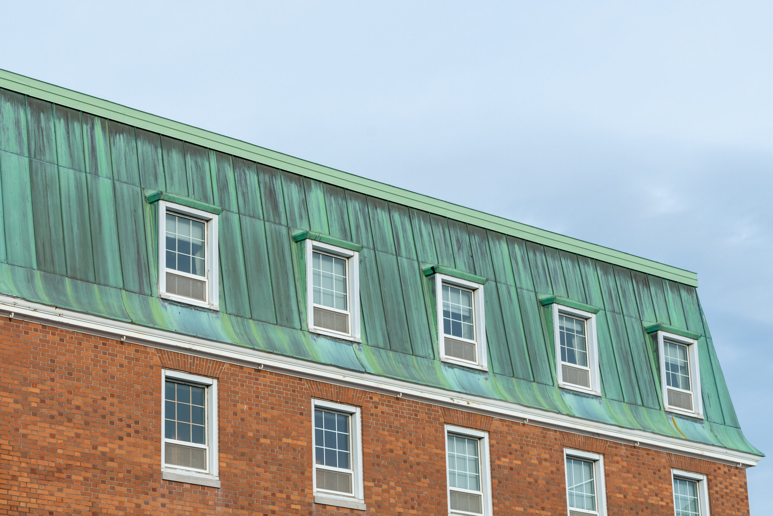 Why Does Copper Roofing and Cladding Turn Green? (Patina Development)